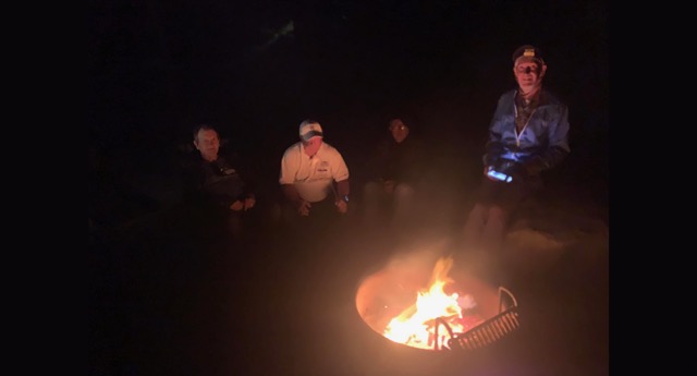 Classmates around the campfire